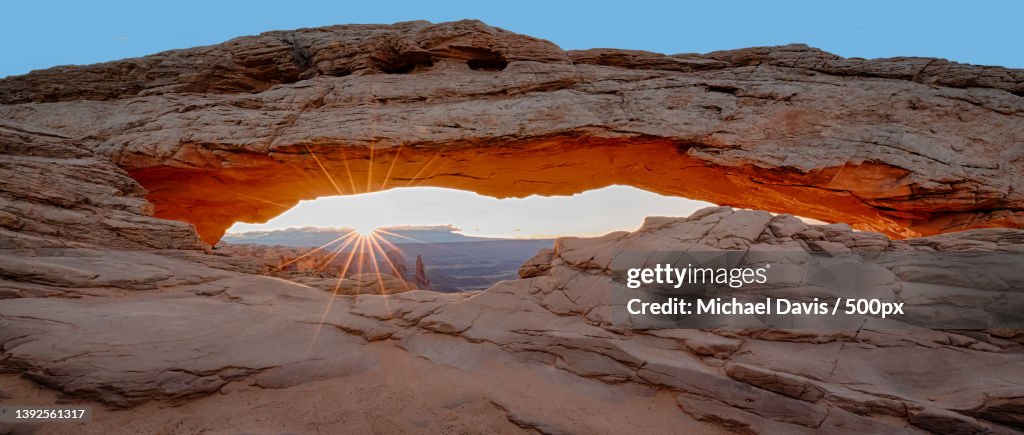 Mesa Arch Sunrise,Low angle view of rock formation against sky,Mesa Arch,United States,USA