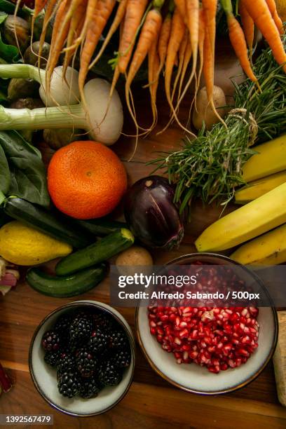 high angle view of vegetables on table,mexico city,mexico - retrato familia stock-fotos und bilder