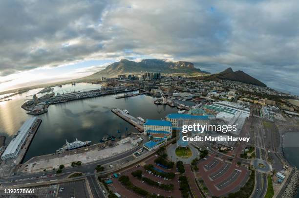 spectacular high aerial view of table bay hotel in foreground, cape town business district ,waterfront,city centre,table mountain,lion's head,signal hill,cape town, south africa - table mountain south africa fotografías e imágenes de stock