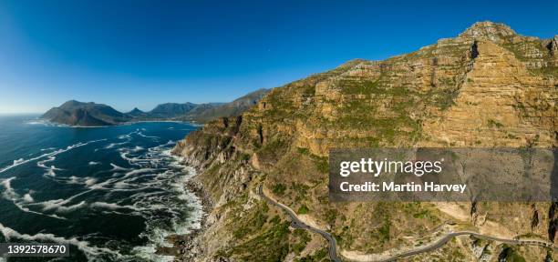 spectacular iconic aerial panoramic view of scenic chapman's peak drive,cape town, south africa - chapmans peak stock pictures, royalty-free photos & images