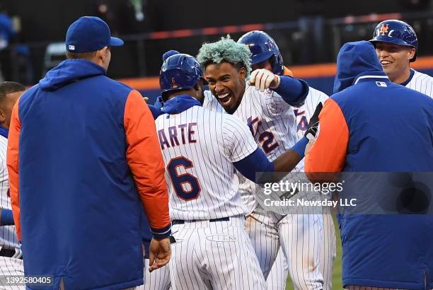 New York Mets' Francisco Lindor celebrates his walk-off RBI single in the bottom of the 10th inning to win their game against the San Francisco...