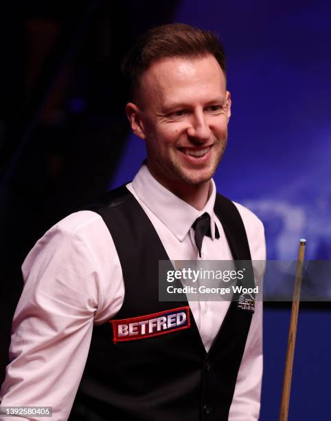 Judd Trump of England reacts during the Betfred World Snooker Championship Round One match between Judd Trump of England and Hossein Vafaei of Iran...