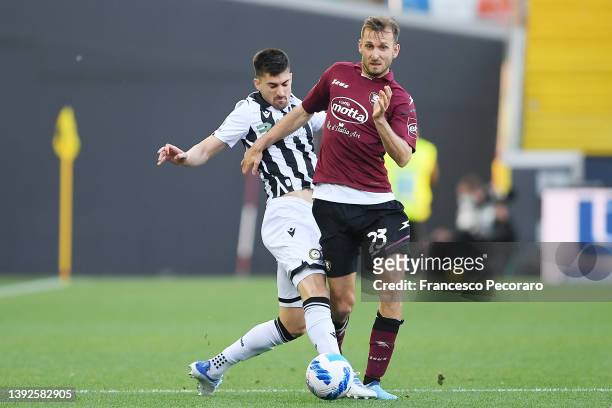 Ignacio Pussetto of Udinese Calcio vies with Norbert Gyomber of US Salernitana during the Serie A match between Udinese Calcio and US Salernitana at...