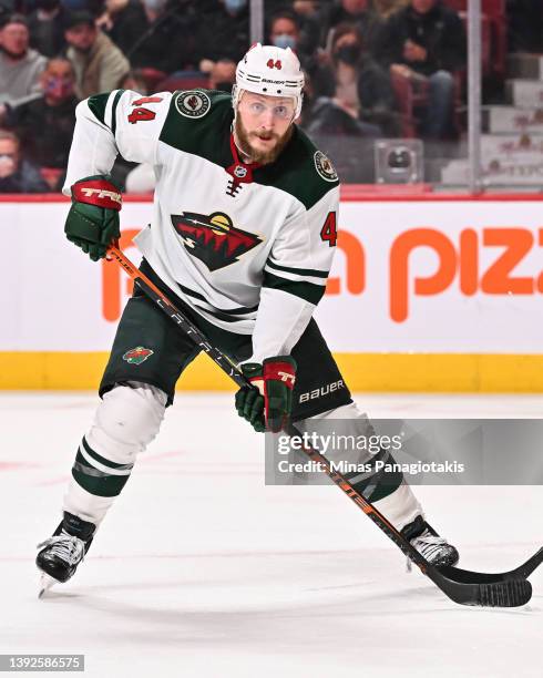 Nicolas Deslauriers of the Minnesota Wild skates in his 500th career NHL game during the third period against the Montreal Canadiens at Centre Bell...