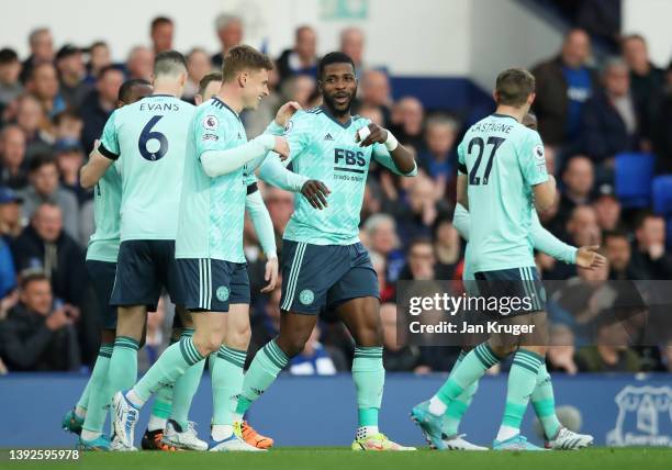 Harvey Barnes of Leicester City celebrates with team mates after scoring their side's first goal during the Premier League match between Everton and...