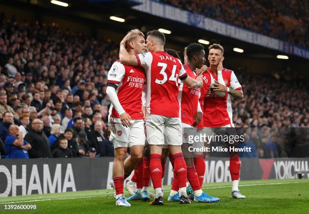 Emile Smith Rowe celebrates with Granit Xhaka of Arsenal after scoring their team's second goal during the Premier League match between Chelsea and...