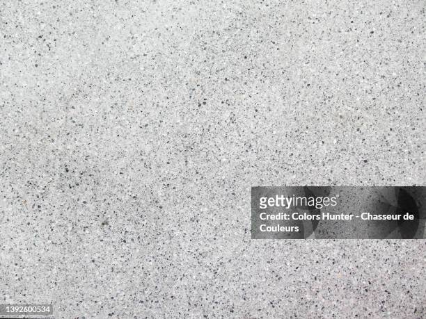 empty clean white and gray spotted granite wall in paris - granite stock pictures, royalty-free photos & images