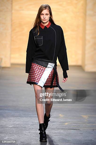 Model walks the runway at the Proenza Schouler Fall 2012 fashion show during Mercedes-Benz Fashion Week at on February 15, 2012 in New York City.
