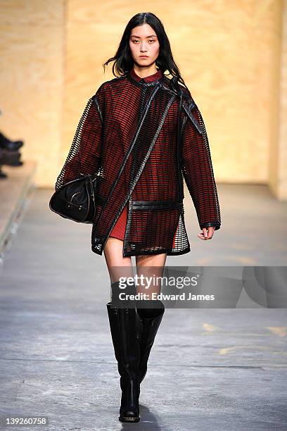 Model walks the runway at the Proenza Schouler Fall 2012 fashion show during Mercedes-Benz Fashion Week at on February 15, 2012 in New York City.