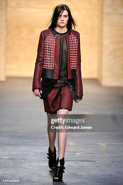 Model walks the runway at the Proenza Schouler Fall 2012 fashion show during Mercedes-Benz Fashion Week on February 15, 2012 in New York City.