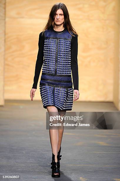 Model walks the runway at the Proenza Schouler Fall 2012 fashion show during Mercedes-Benz Fashion Week on February 15, 2012 in New York City.