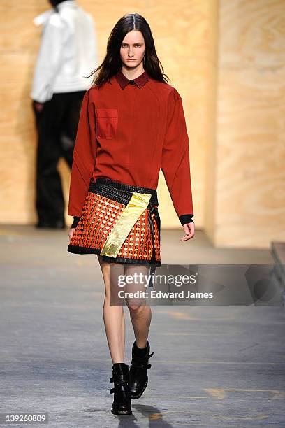 Model walks the runway at the Proenza Schouler Fall 2012 fashion show during Mercedes-Benz Fashion Week on February 15, 2012 in New York City.