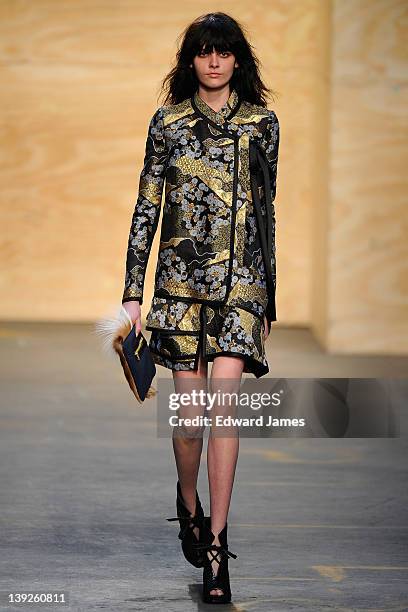 Model walks the runway at the Proenza Schouler Fall 2012 fashion show during Mercedes-Benz Fashion Week on February 15, 2012 in New York City.