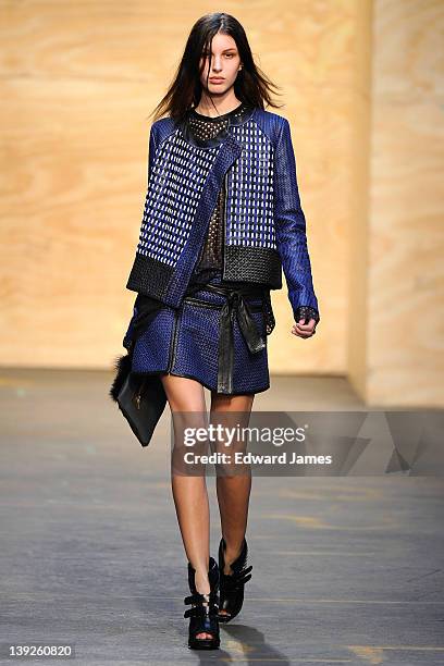 Model walks the runway at the Proenza Schouler Fall 2012 fashion show during Mercedes-Benz Fashion Week on February 15, 2012 in New York City.