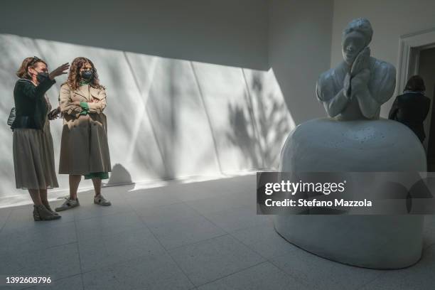 Tourists and locals visit the US pavilion during the 59th International Art Exhibition on April 20, 2022 in Venice, Italy. The 59th International Art...