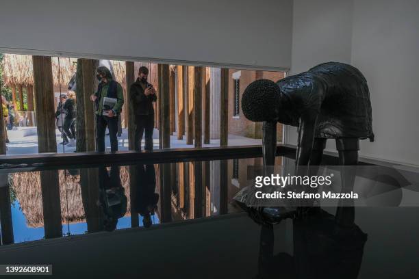 Tourists and locals visit the US pavilion during the 59th International Art Exhibition on April 20, 2022 in Venice, Italy. The 59th International Art...