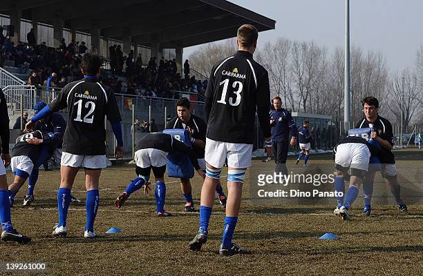 Italy U18 players warm up before the U18 rugby test match between Italy U18 and Ireland U18 on February 18, 2012 in Badia Polesine, Italy.
