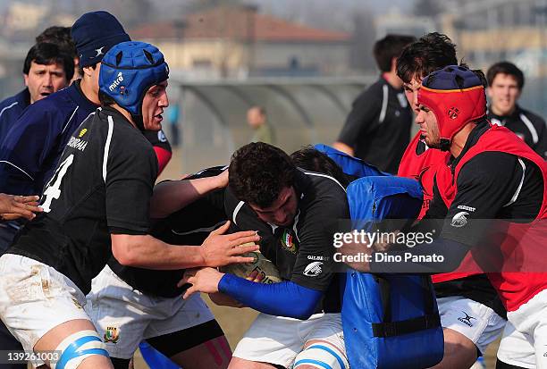 Italy U18 players warm up before the U18 rugby test match between Italy U18 and Ireland U18 on February 18, 2012 in Badia Polesine, Italy.