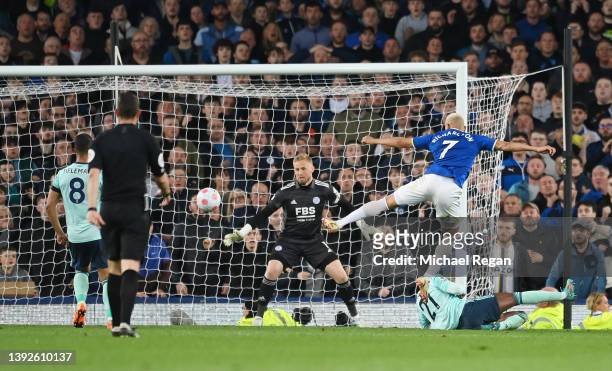 Richarlison of Everton scores their side's first goal during the Premier League match between Everton and Leicester City at Goodison Park on April...