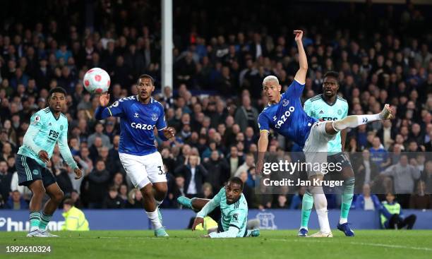 Richarlison of Everton scores their side's first goal during the Premier League match between Everton and Leicester City at Goodison Park on April...