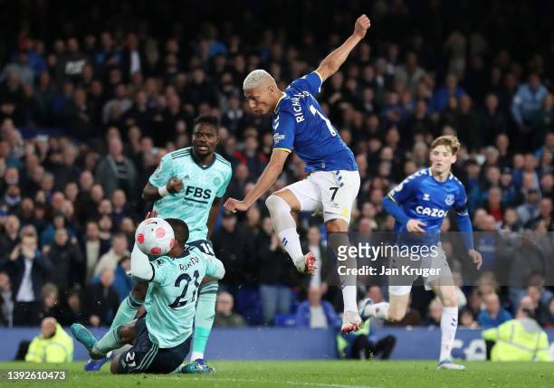Richarlison of Everton scores their side's first goal during the Premier League match between Everton and Leicester City at Goodison Park on April...