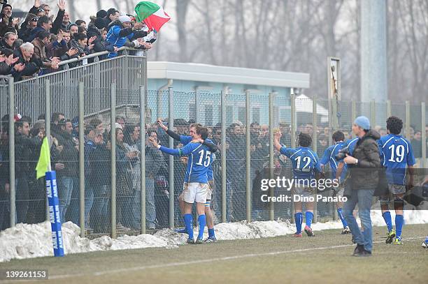 Italy players celebrates the victory with fans after the U18 rugby test match between Italy U18 and Ireland U18 on February 18, 2012 in Badia...