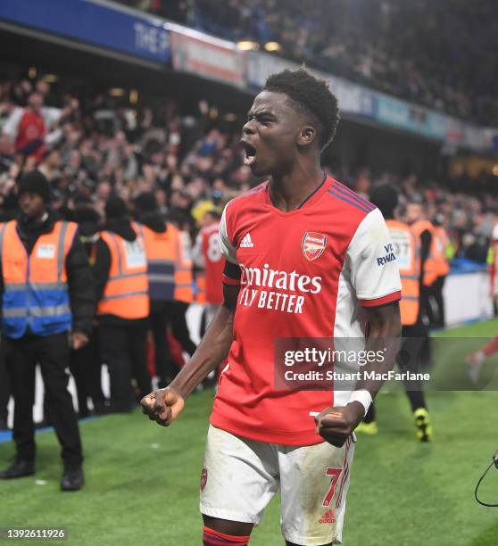 Bukayo Saka celebrates scoring the 4th Arsenal goal during the Premier League match between Chelsea and Arsenal at Stamford Bridge on April 20, 2022...