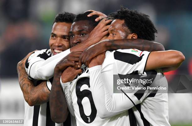 Danilo of Juventus celebrates after scoring their side's second goal with team mates during the Coppa Italia Semi Final 2nd Leg match between...