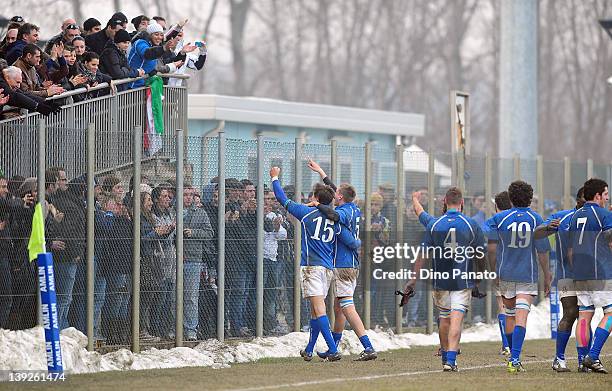 Italy players celebrates the victory with fans after the U18 rugby test match between Italy U18 and Ireland U18 on February 18, 2012 in Badia...