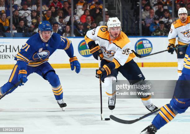 Matt Duchene of the Nashville Predators skates against Victor Olofsson of the Buffalo Sabres during an NHL game on April 1, 2022 at KeyBank Center in...