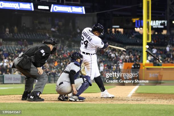 Miguel Cabrera of the Detroit Tigers hits a single in the sixth inning in front of Kyle Higashioka of the New York Yankees to reach 2999 career hits...