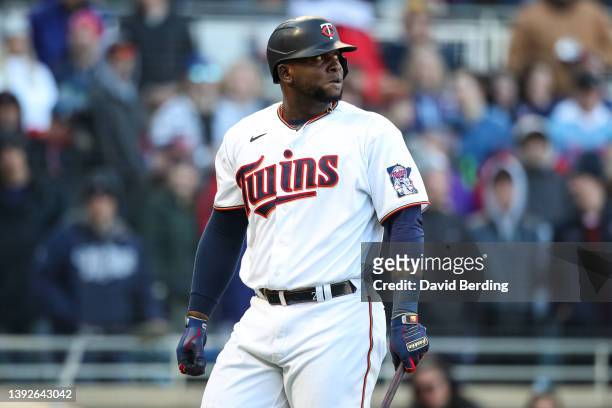 Miguel Sano of the Minnesota Twins reacts to striking out against the Seattle Mariners in the ninth inning of the game on Opening Day at Target Field...
