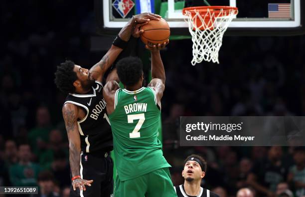 Kyrie Irving of the Brooklyn Nets blocks a shot from Jaylen Brown of the Boston Celtics during the third quarter of Game Two of the Eastern...