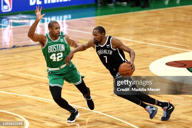 Kevin Durant of the Brooklyn Nets drives towards the basket against Al Horford of the Boston Celtics during the fourth quarter of Game Two of the...