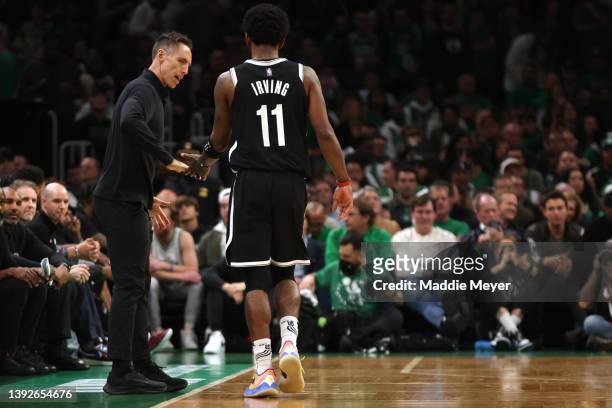 Brooklyn Nets head coach Steve Nash talks with Kyrie Irving during the third quarter of Game Two of the Eastern Conference First Round NBA Playoffs...