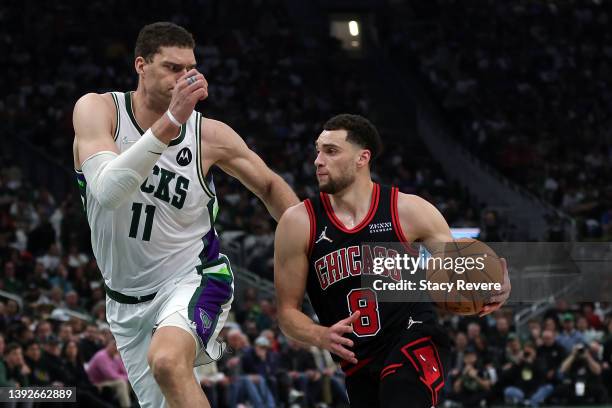 Zach LaVine of the Chicago Bulls is defended by Brook Lopez of the Milwaukee Bucks in the second quarter during Game Two of the Eastern Conference...