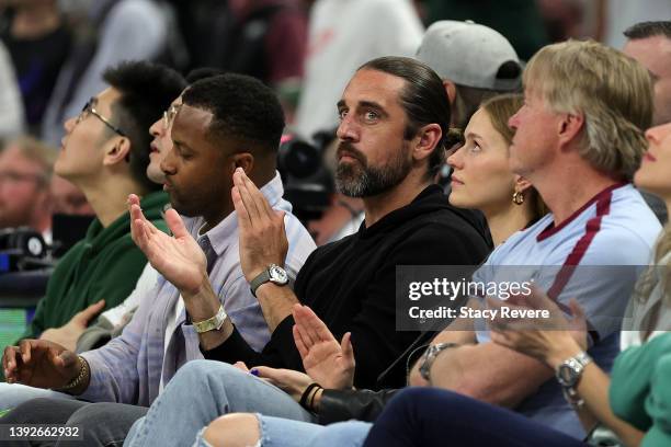 Green Bay Packers quarterback Aaron Rodgers watches action during Game Two of the Eastern Conference First Round Playoffs between the Milwaukee Bucks...