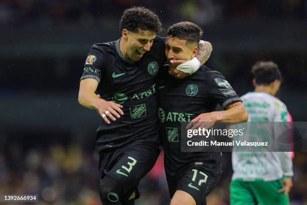 Alejandro Zendejas of America celebrates after scoring the second goal of his team with teammate Jorge Sánchez during the 15th round match between...