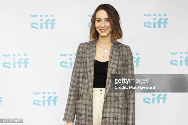 Actress Troian Bellisario arrives the world premiere of the film "Doula" during the Seattle International Film Festival at SIFF Uptown Theatre on...