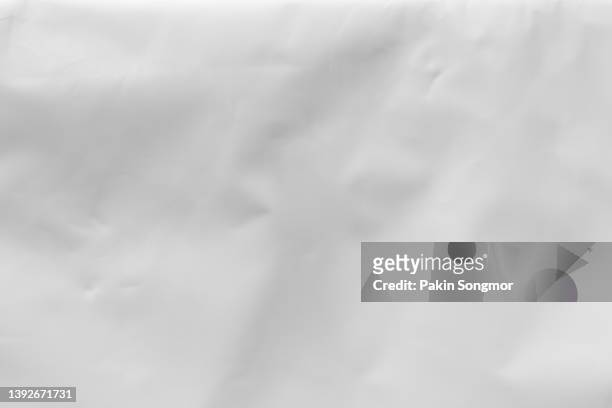 close up of a white plastic incontinence pad texture background. - paper wrinkled stock-fotos und bilder