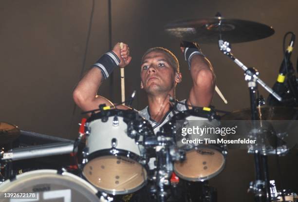 Christoph Schneider of Rammstein performs during the "Pledge of Allegiance" tour at Cox Arena on September 30, 2001 in San Diego, California.