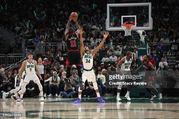 DeMar DeRozan of the Chicago Bulls shoots over Giannis Antetokounmpo of the Milwaukee Bucks during the second half of Game Two of the Eastern...