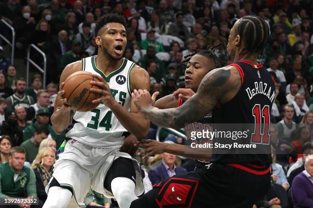Giannis Antetokounmpo of the Milwaukee Bucks is defended by DeMar DeRozan of the Chicago Bulls in the second half of Game Two of the Eastern...