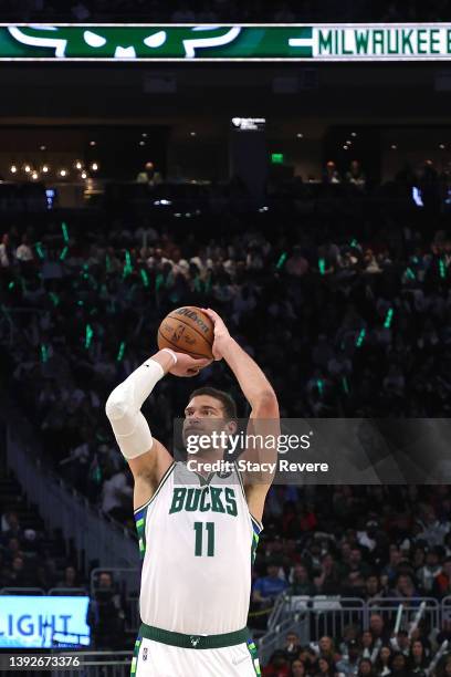 Brook Lopez of the Milwaukee Bucks takes a three point shot against the Chicago Bulls in the second half of Game Two of the Eastern Conference First...