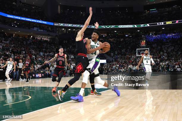 Giannis Antetokounmpo of the Milwaukee Bucks drives to the basket against Zach LaVine of the Chicago Bulls in the second half of Game Two of the...