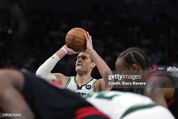 Brook Lopez of the Milwaukee Bucks shoots a free throw in the second half of Game Two of the Eastern Conference First Round Playoffs against the...