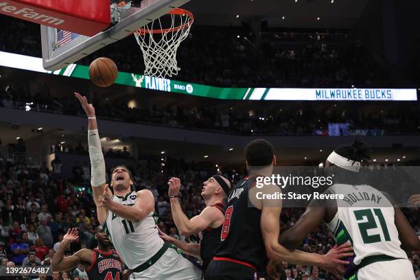 Brook Lopez of the Milwaukee Bucks drives to the basket in the second half of Game Two of the Eastern Conference First Round Playoffs against the...