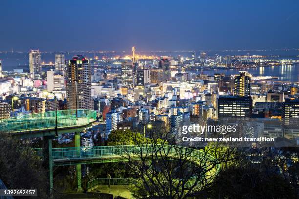night view of kobe city skyline from venus bridge, japan - kobe japan stock-fotos und bilder