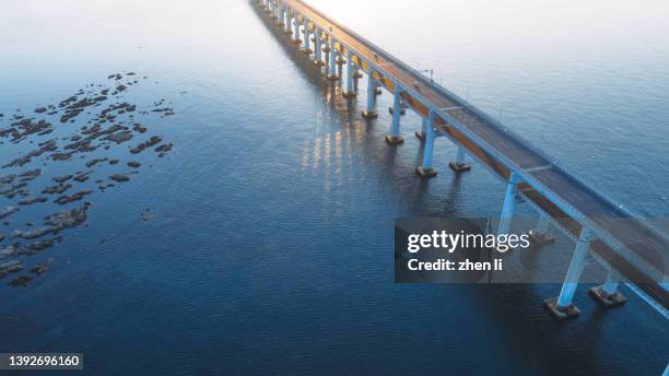 aerial view of cross-sea bridge - beach bird's eye perspective stock pictures, royalty-free photos & images