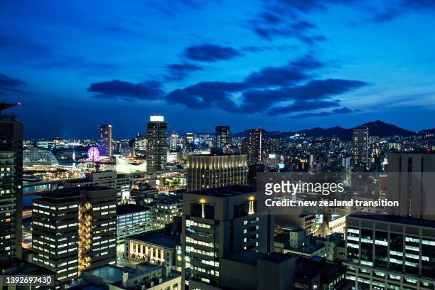 high angle view of kobe port area in blue hour, japan - kobe japan stock pictures, royalty-free photos & images
